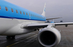 Photo of an passenger airplane wing and engine