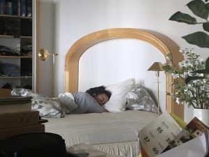 Woman sleeping in a bed