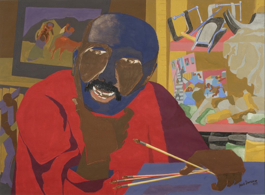 Jacob Lawrence sitting down for a self portrait