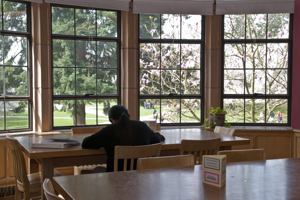 student studying in the music library