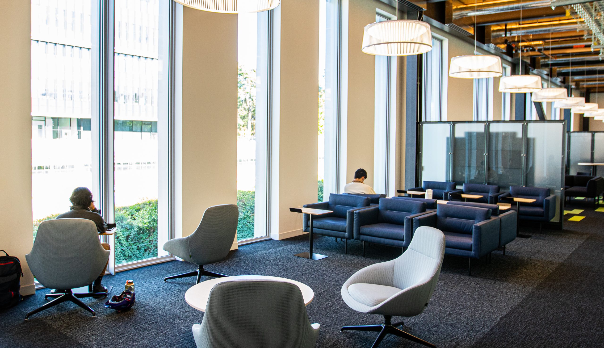 Students studying in light-filled space