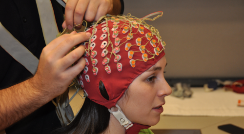 Woman hooked up to EEG