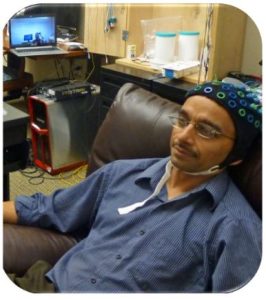 Raj Rao wearing EEG headcap