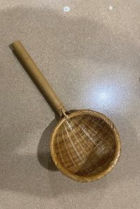 Traditional rattan strainer from Meloy's (Charisse's dad) personal collection