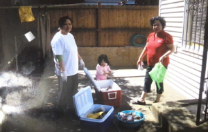 Charisse's family (mom and her) post-fishing trip