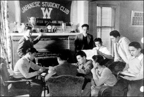 Japanese Students Club members by fireplace Nov. 1941.