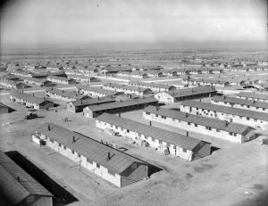 Birdseye view of rows of barracks.