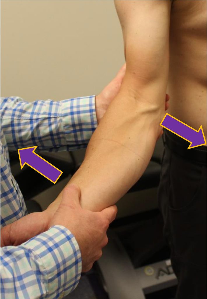 Valgus stress on the elbow